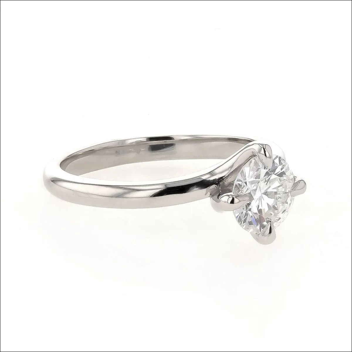 Diamond 4 Prong Twist Solitaire Engagement Ring Platinum