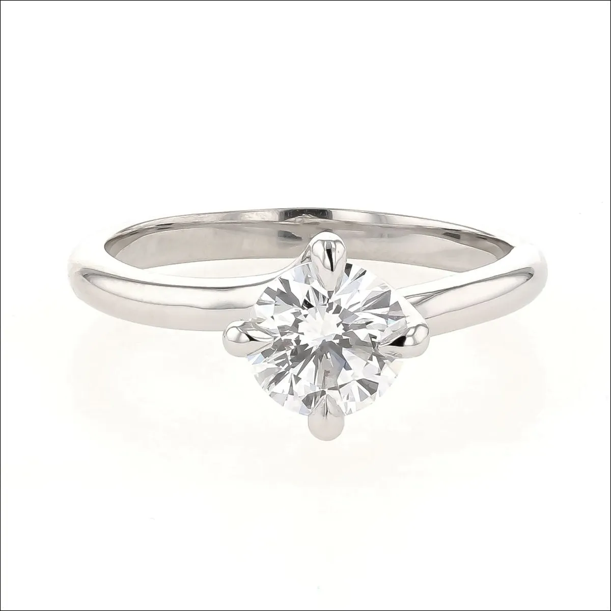 Diamond 4 Prong Twist Solitaire Engagement Ring Platinum